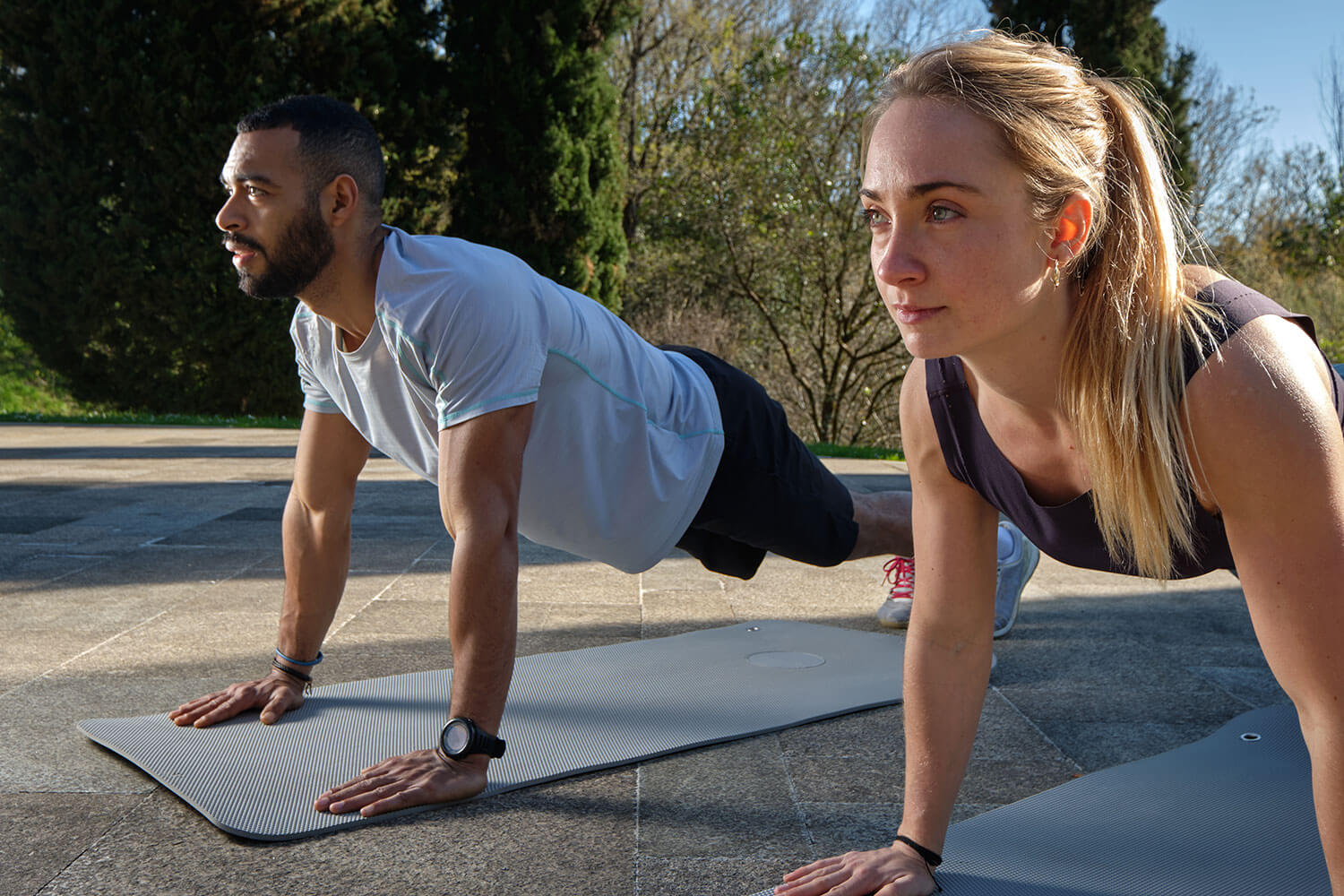 how to stay active, couple doing push ups